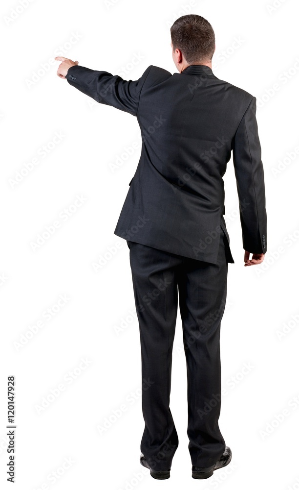 Back view of pointing business man. gesticulating young guy in black suit. Rear view people collection. Isolated over white background. backside view of person. Back view of pointing business man. gesticulating young guy in black suit. Rear view people collection. Isolated over white background. backside view of person.
