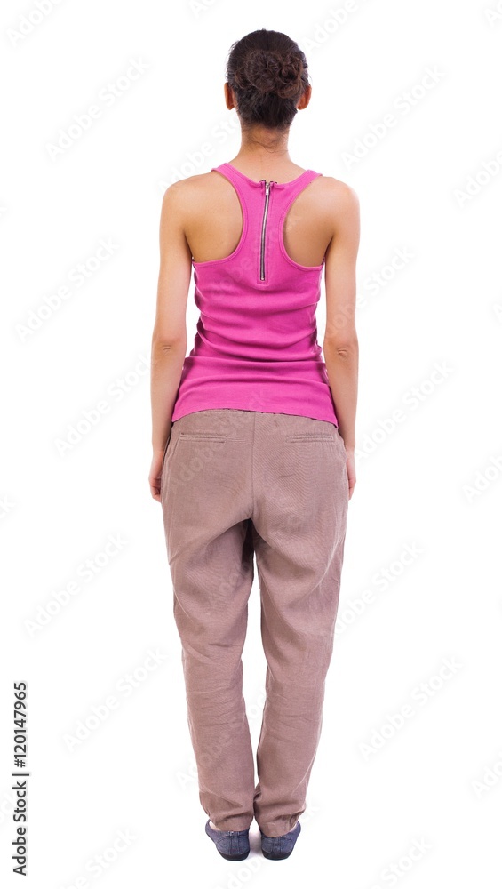 back view of standing young beautiful woman. girl watching. Rear view people collection. backside view of person. Isolated over white background. African-American woman in a red T-shirt standing back view of standing young beautiful woman. girl watching. Rear view people collection. backside view of person. Isolated over white background. African-American woman in a red T-shirt standing