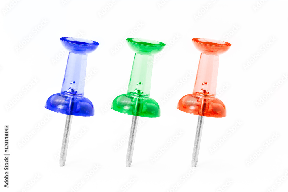 Red, Green, and Blue translucent push pins on white background Red, Green, and Blue translucent push pins on white background