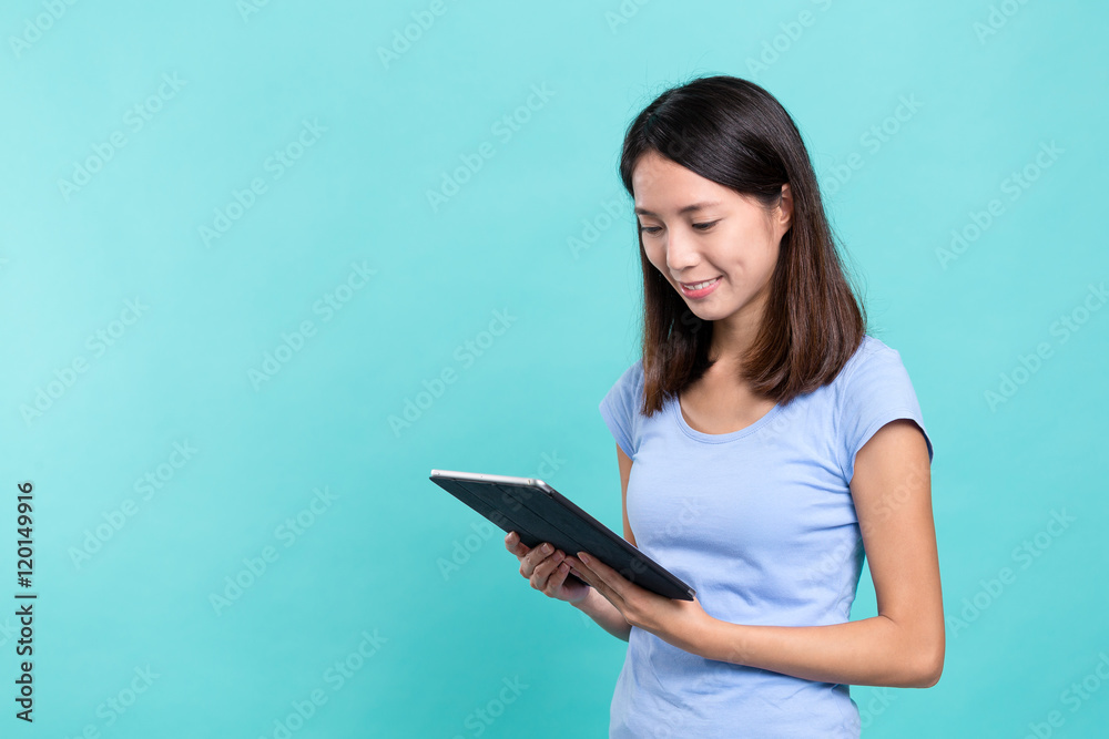 Woman using dgital tablet computer Woman using dgital tablet computer
