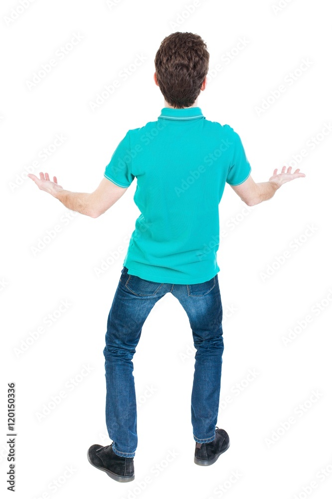 A man raised his hands in prayer. Standing young man. Rear view people collection. backside view of person. Isolated over white background. The guy in a stylish aquamarine shirt angrily waving his A man raised his hands in prayer. Standing young man. Rear view people collection. backside view of person. Isolated over white background. The guy in a stylish aquamarine shirt angrily waving his