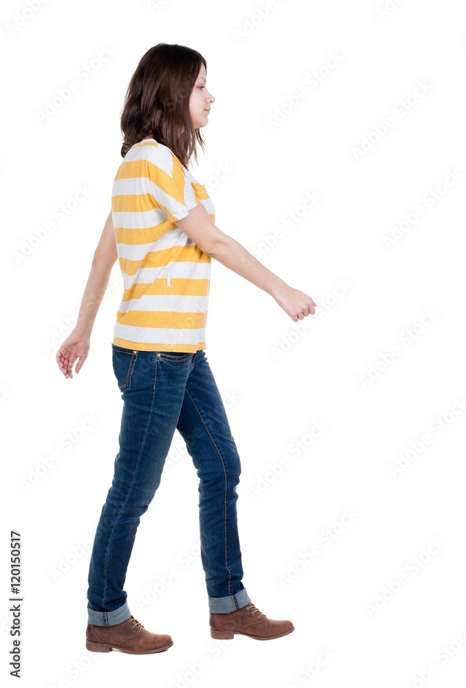 back view of walking woman in jeans . beautiful brunette girl in motion. backside view of person. Rear view people collection. Isolated over white background. back view of walking woman in jeans . beautiful brunette girl in motion. backside view of person. Rear view people collection. Isolated over white background.