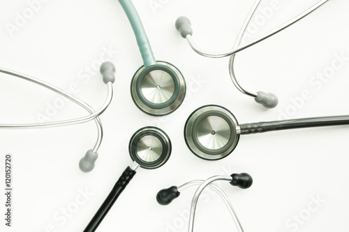Three different stethoscopes grouped together representing multidisciplinary teamwork