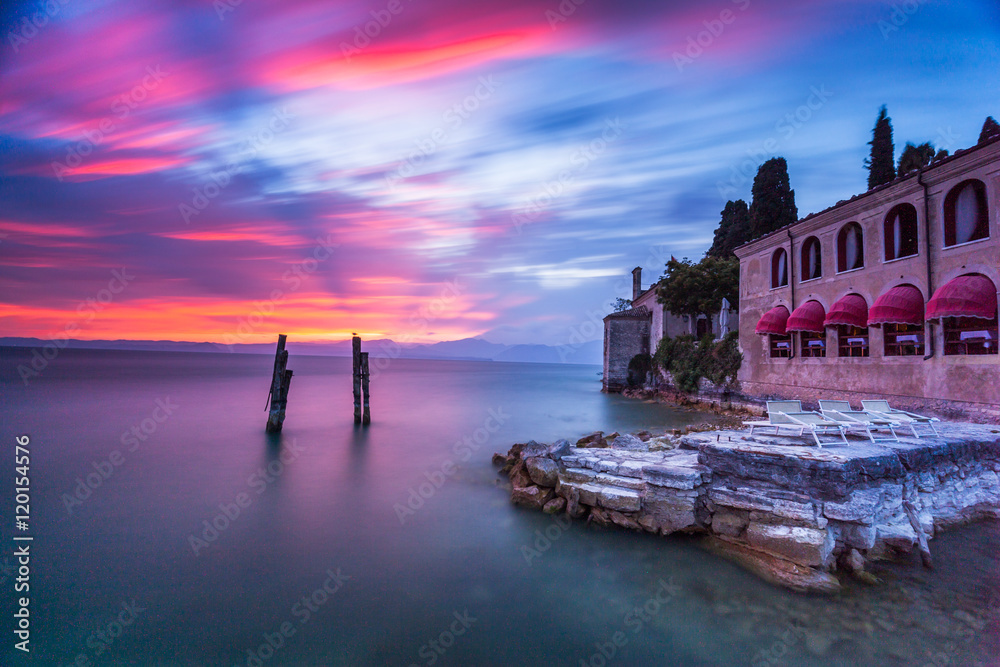 Fototapeta premium Beautiful sunset in villa Lake Garda 