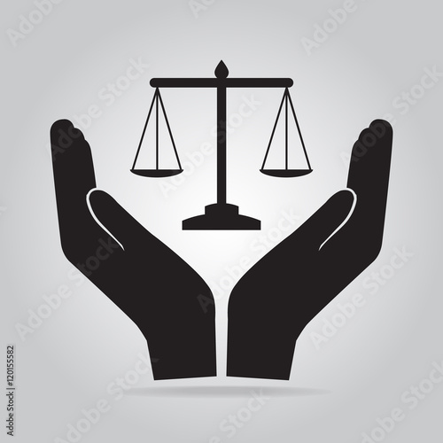 Justice scale in hand icon