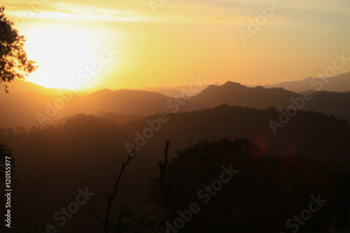 Sun-rising behind the Himalayas in Kasauli, Himachal Pradesh, India at Dawn. Kasauli (Hindi: कसौली) is a cantonment and town, located in Solan district in the Indian state of Himachal Pradesh. 
