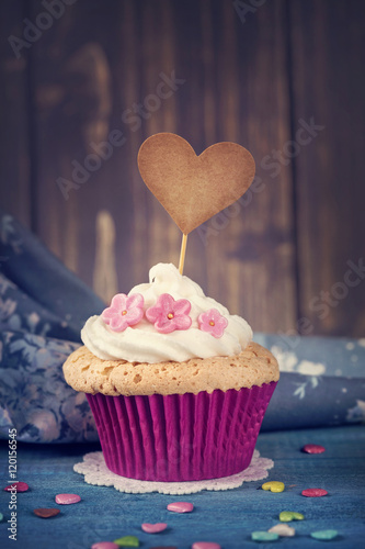 Cupcake with a cakepick photo