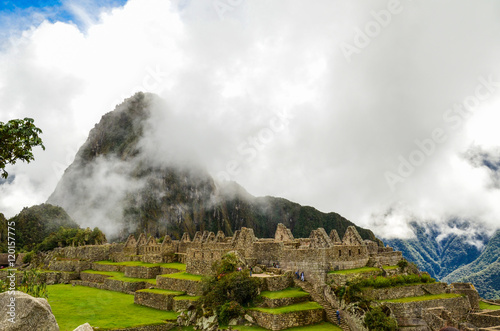MACHU PICCHU, CUSCO REGION, PERU- JUNE 4, 2013: Panoramic view of the 15th-century Inca citadel Machu Picchu, UNESCO World Heritage Site