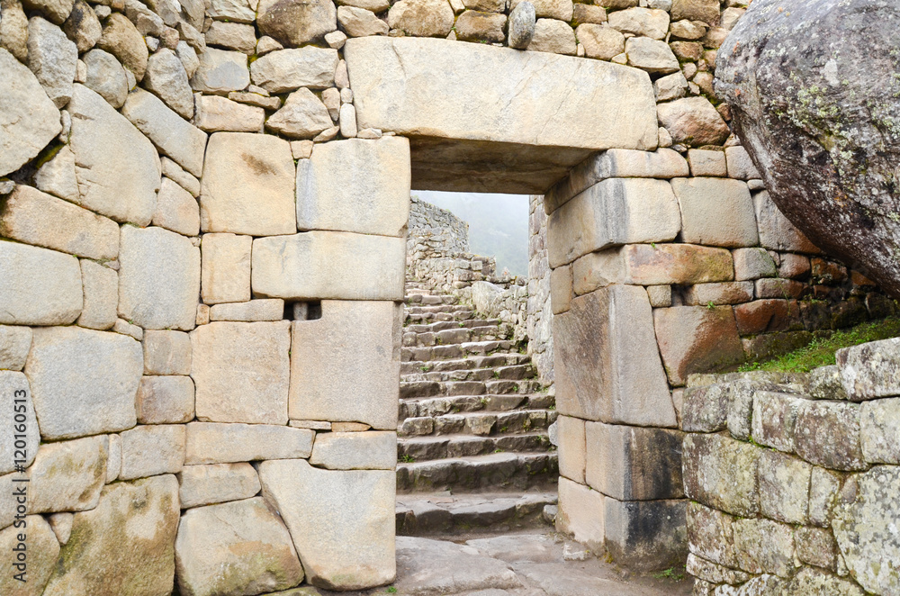 MACHU PICCHU, CUSCO REGION, PERU- JUNE 4, 2013: Details of the residential area of the 15th-century Inca citadel Machu Picchu, UNESCO World Heritage Site