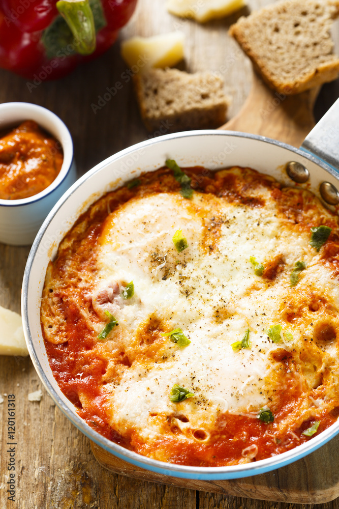Omelette with cheese, bell pepper and tomatoes