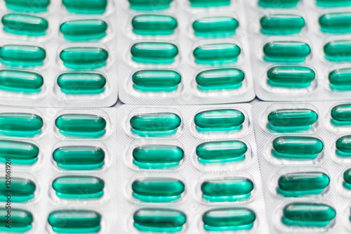 Green capsule blisters,Selective focus