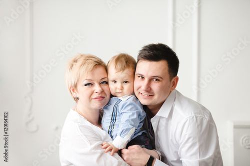 young mother and her husband spend time with his son