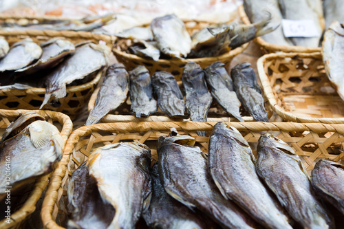 Different kinds of dried fish in the store at beer fesival photo