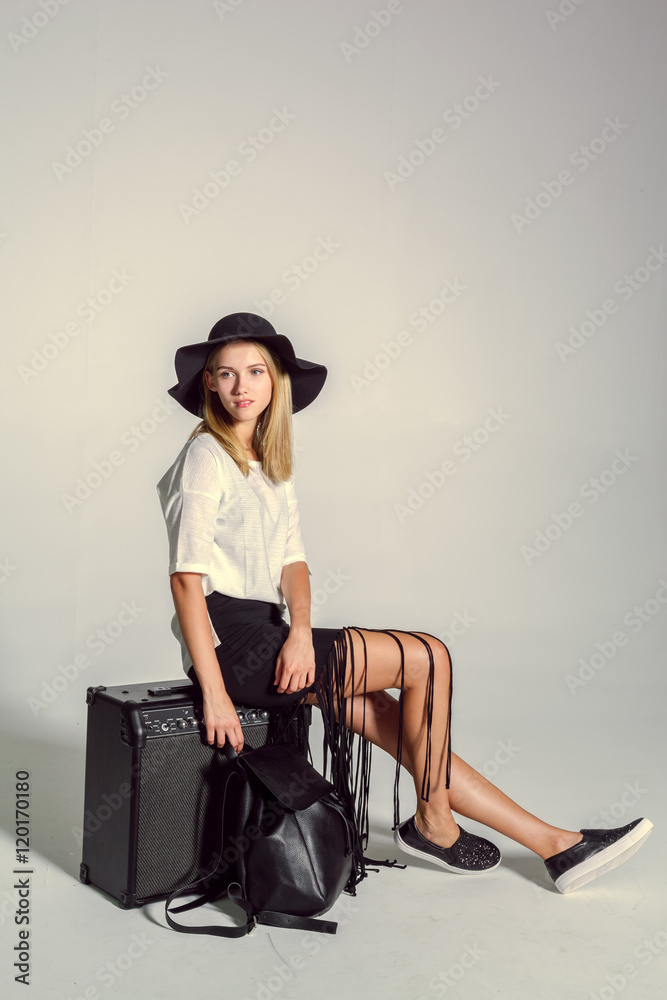 beautiful young woman posing in studio. Fashion photo beautiful young woman posing in studio. Fashion photo