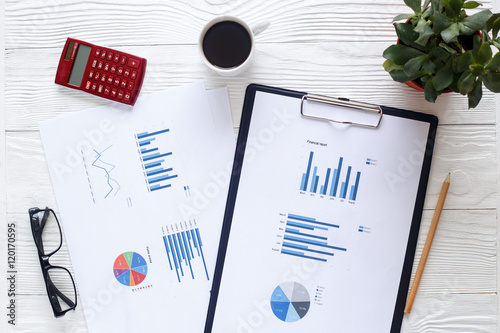 Photos workplace economist on white office table