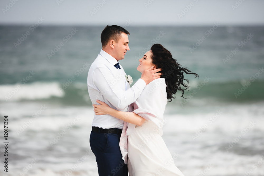 Husband and wife by the sea