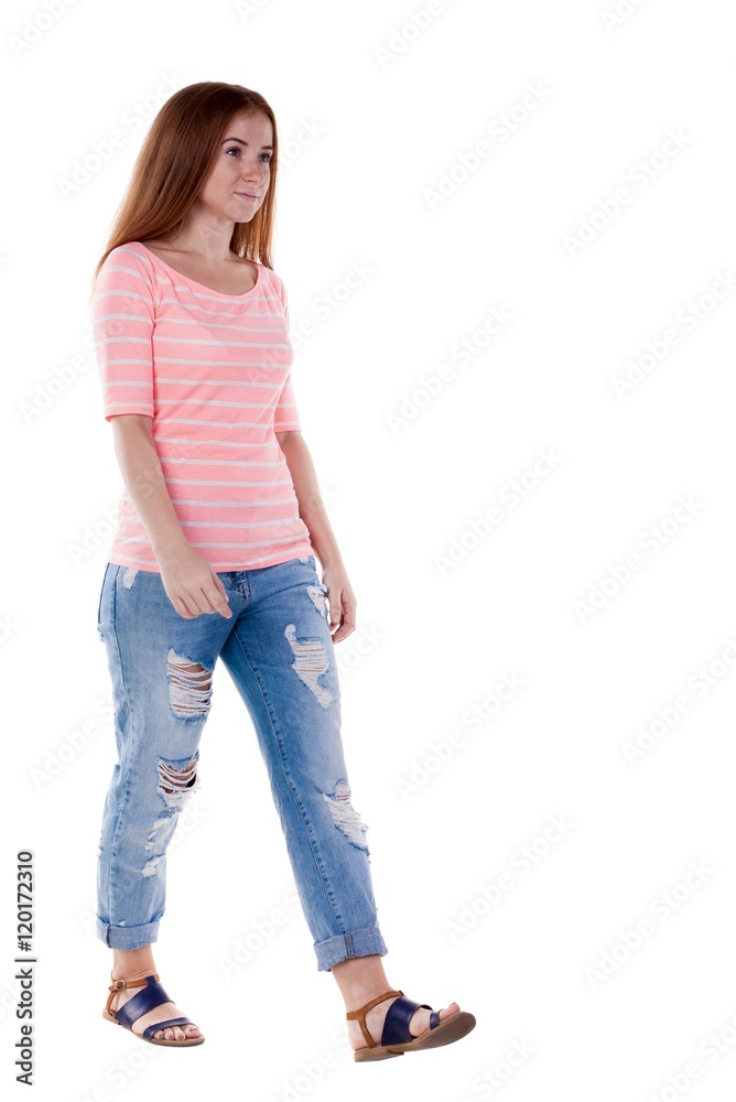 back view of walking woman . beautiful redhead girl in motion. backside view of person. Rear view people collection. Isolated over white background. back view of walking woman . beautiful redhead girl in motion. backside view of person. Rear view people collection. Isolated over white background.