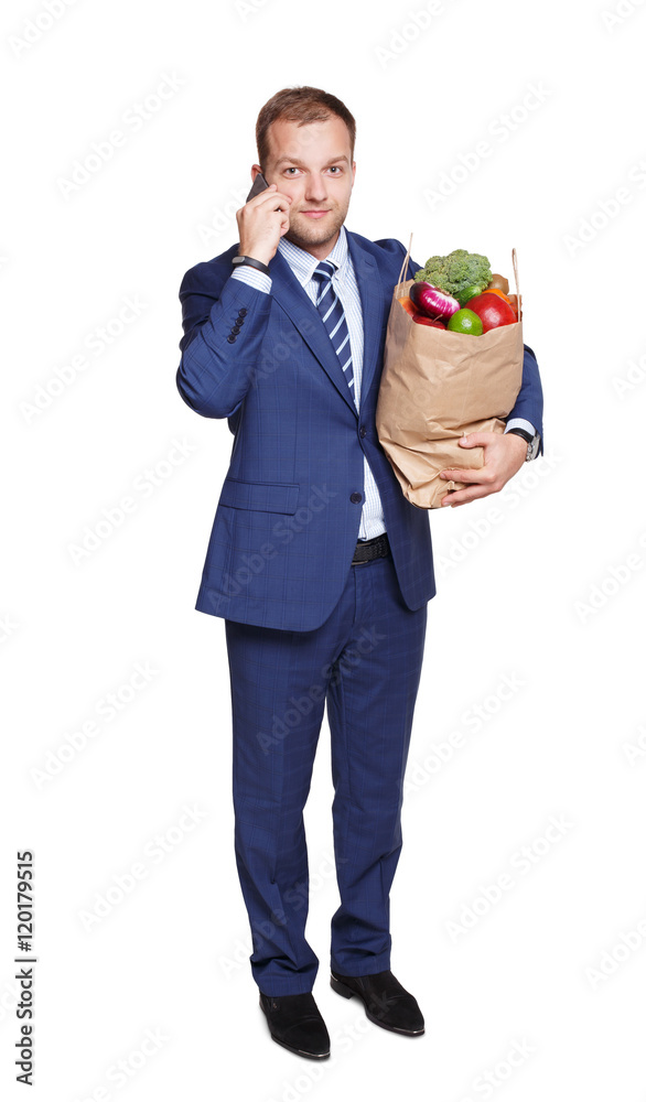 Businessman with healthy food, grocery buyer isolated Businessman with healthy food, grocery buyer isolated
