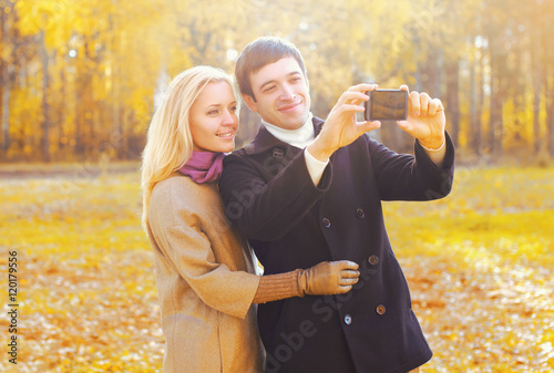Happy smiling young couple together taking picture self portrait © rohappy