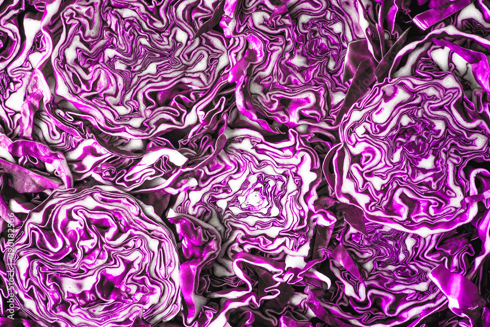 Sliced red cabbage background cloth-up