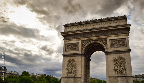 Triumphal arch in Paris city at sunset. Arc de Triomphe in Paris, France. Famous Paris view on triumphal arch © mochipet