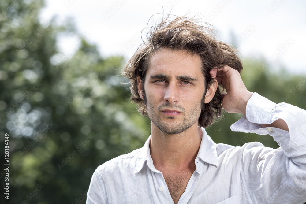 Portrait of young man with brown hair Portrait of young man with brown hair