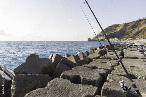 view first breakwater floor with fishing rods  italy