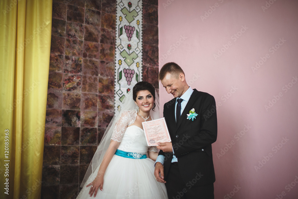Fototapeta premium Joyful couple after the wedding ceremony