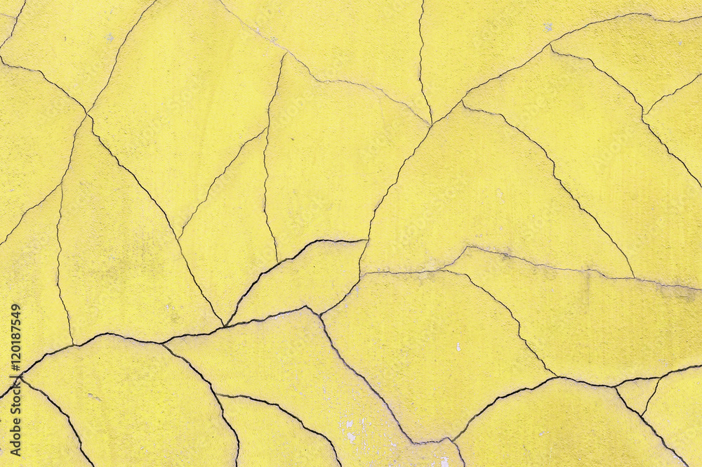 Closeup surface old and crack yellow cement wall texture backgro