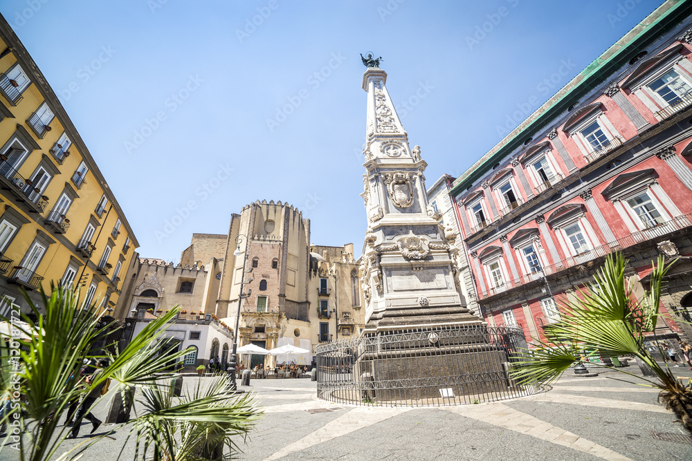 Neapolitan square with a monument in the center, Italy