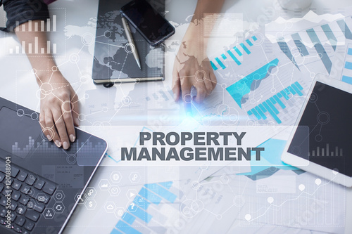 Woman working with documents, Tablet pc and notebook. Property management Concept.