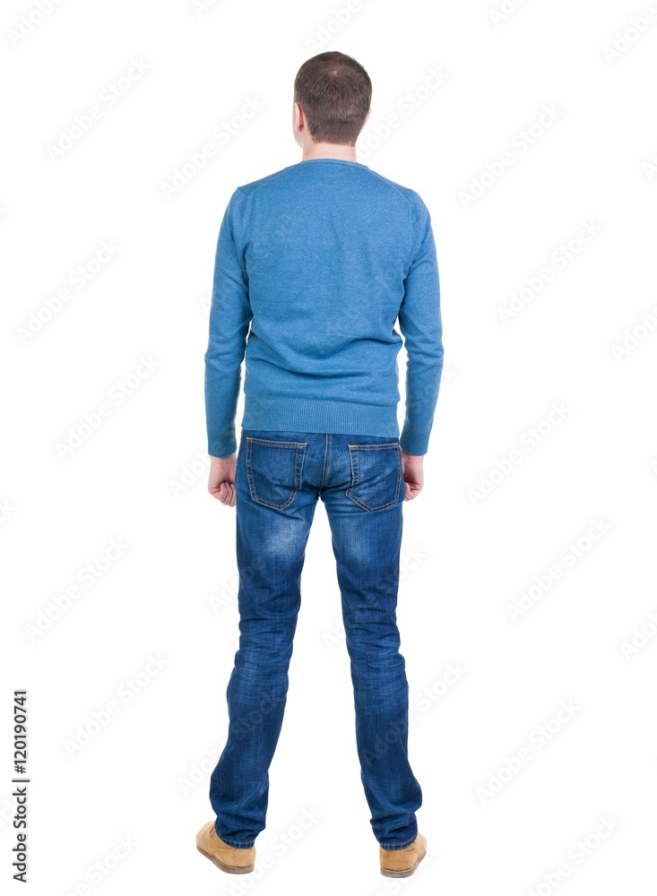 Back view of handsome man in blue pullover. Standing young guy in cardigan. Rear view people collection. backside view of person. Isolated over white background. Back view of handsome man in blue pullover. Standing young guy in cardigan. Rear view people collection. backside view of person. Isolated over white background.