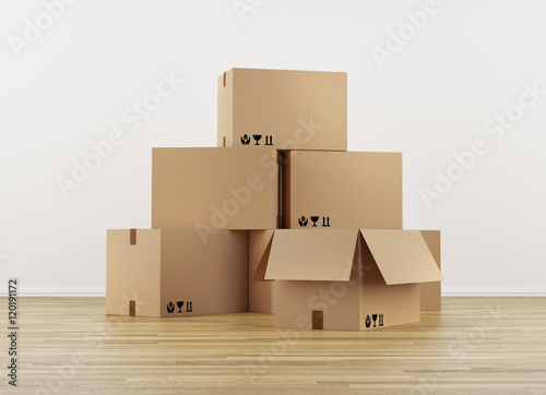 Stack of Cardboard boxes on a wooden floor 3d Render © obadart