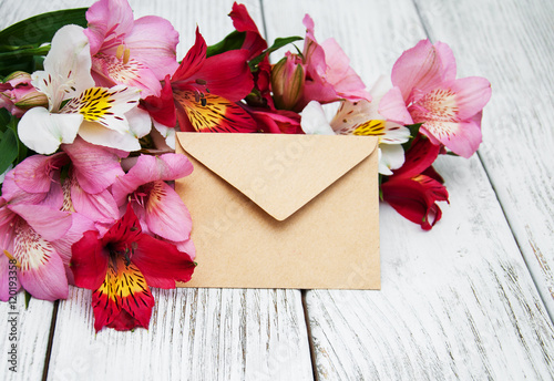 paper envelope with alstroemeria flowers