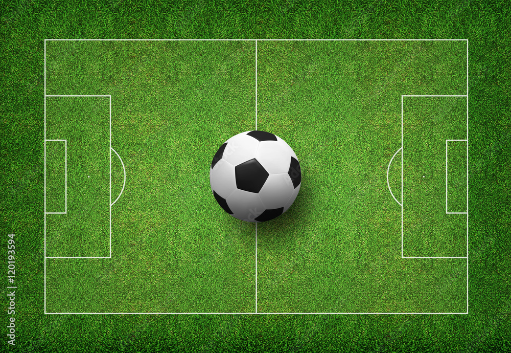Soccer ball on green grass of soccer field. Soccer ball on green grass of soccer field.