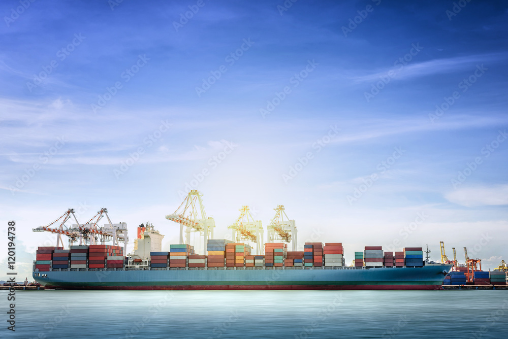 Logistics and transportation of International Container Cargo ship with working crane bridge in seaport for logistic import export background and transport industry. Logistics and transportation of International Container Cargo ship with working crane bridge in seaport for logistic import export background and transport industry.