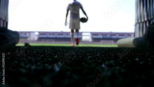Silhouette of a football player going out to the stadium