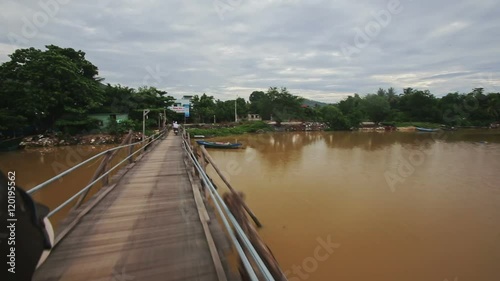 Wallpaper Mural Scooters Ride over River Wooden Bridge to Hilly bank Torontodigital.ca
