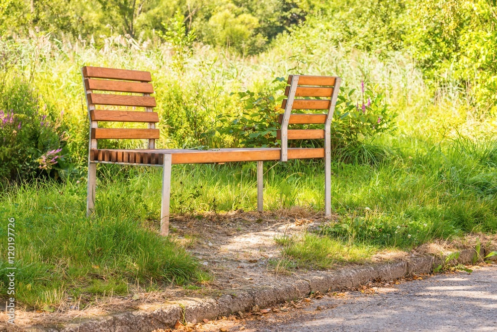 Wooden bench for pairs who can sit face to face