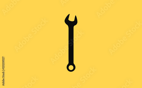 Vector black wrench icon on flat background