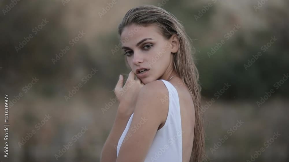 portrait of a beautiful girl in a swimsuit at sunset portrait of a beautiful girl in a swimsuit at sunset