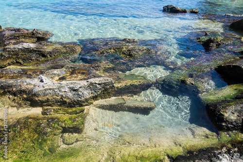 Shallow water on sandy beach