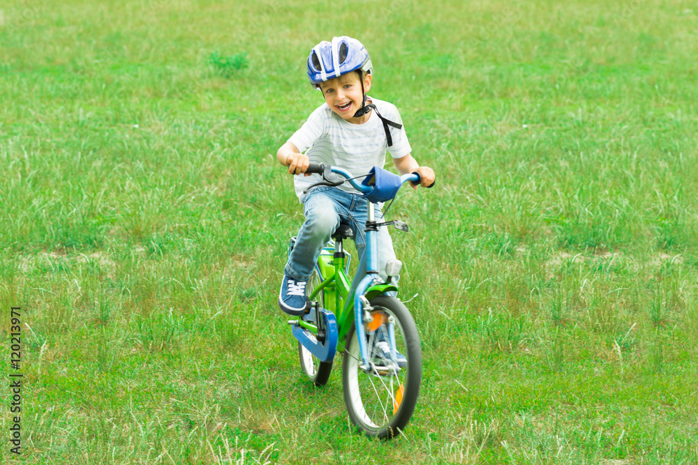 Boy Riding Bicycle