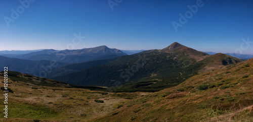 Ukrainian Carpathians, National Park Chornogora. Sunny day. Summertime trekking. View on Petros and Hoverla.