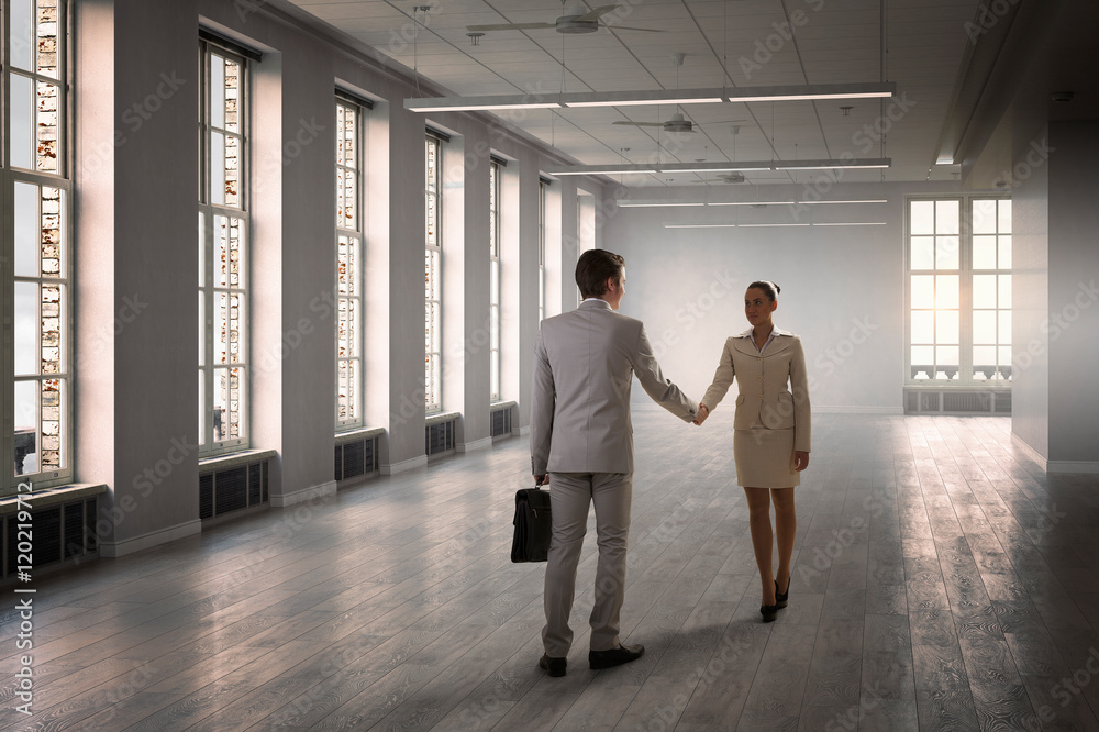 Business partners handshake . Mixed media Business partners handshake . Mixed media