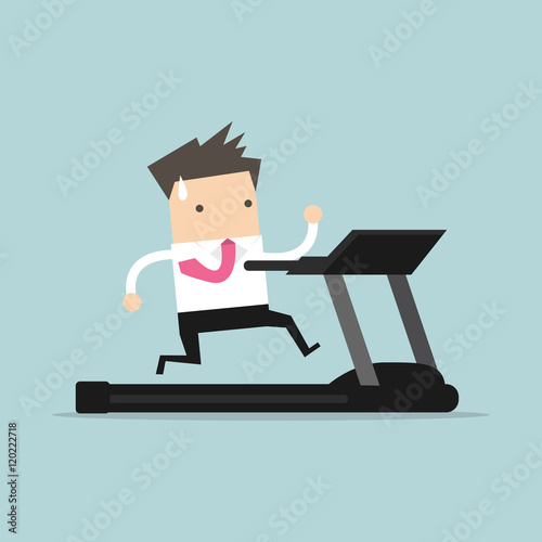 Businessman running on treadmill.