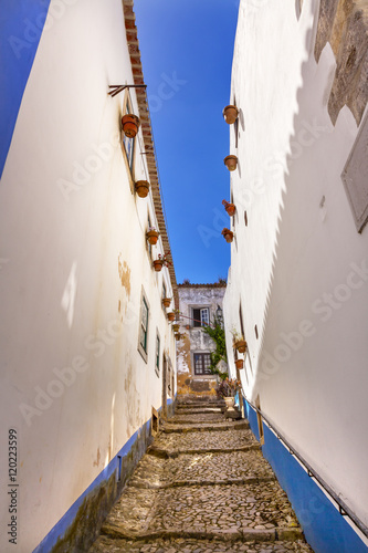 Narrow White Street 11th Century Mediieval City Obidos Portugal photo