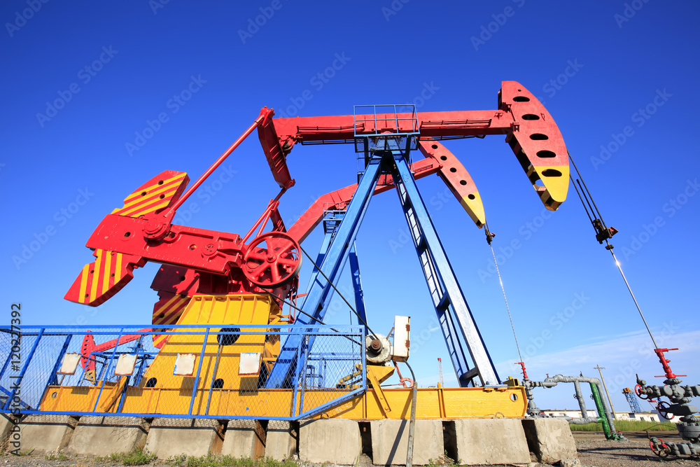 Oil field, oil pump in the work Oil field, oil pump in the work
