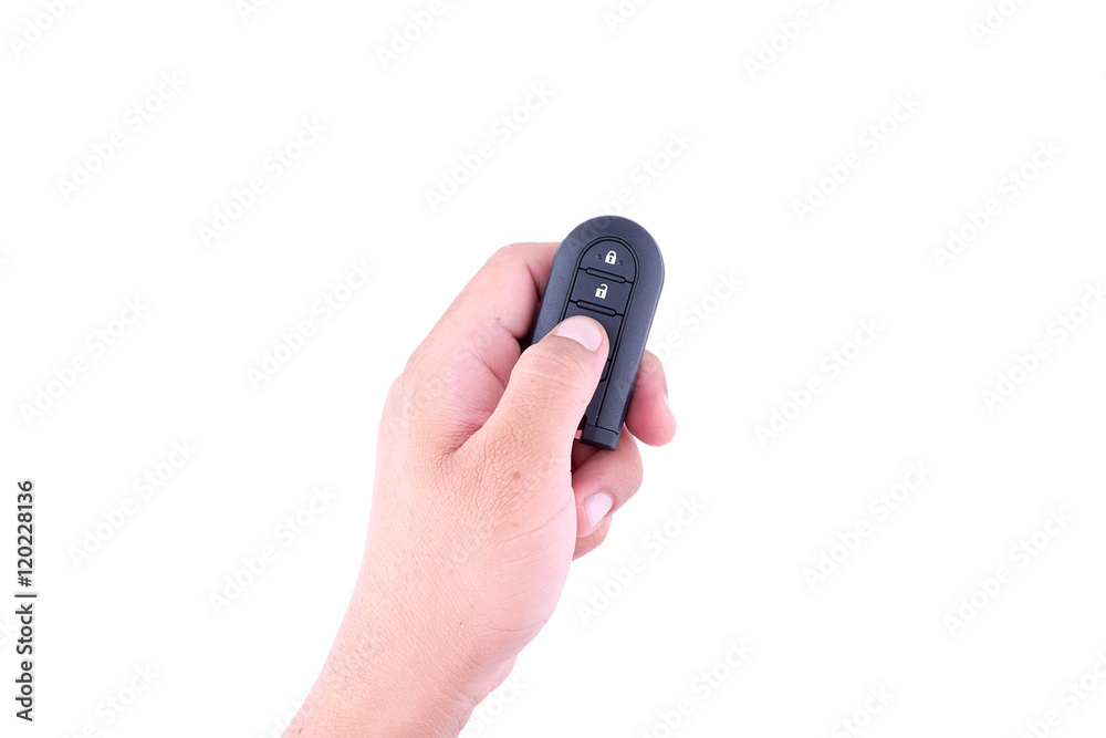 Fototapeta premium hand presses on the remote control car alarm systems