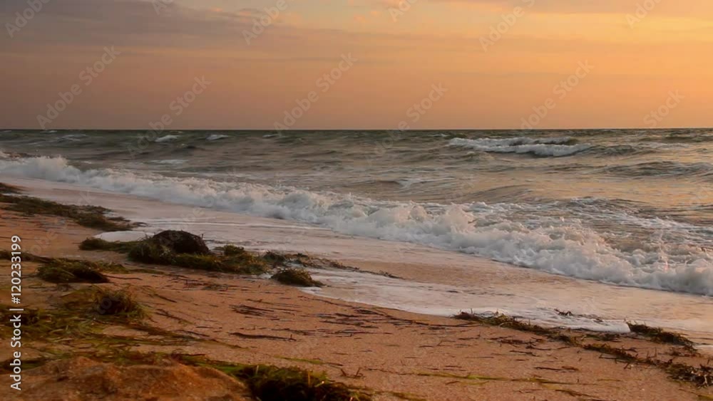 sunrise over the stormy sea slow motion